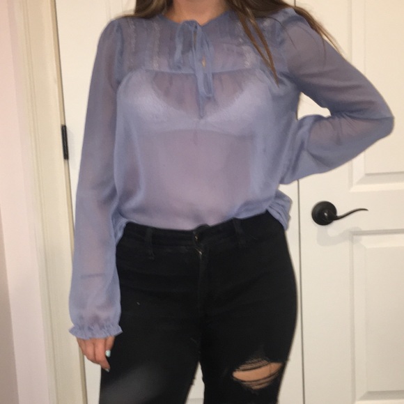 Sheer long sleeve top that creates a sexy outfit - Picture 2 of 3